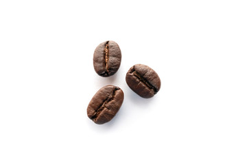 Roasted coffee beans isolated on white background.