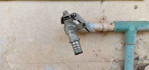 Old faucet in the garden, but still available.