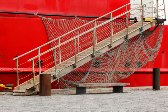 Red Boat with a Bridge Gangway
