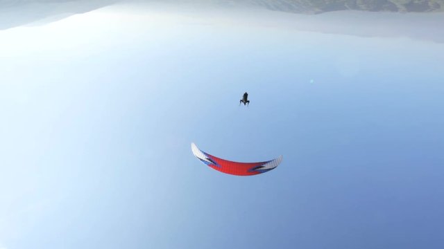 para glider flying overhead, handheld video