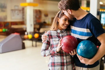 Fototapeta premium Beautiful couple dating and bowling