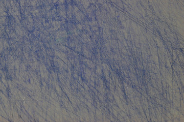 Scratches on a plastic board, background and texture