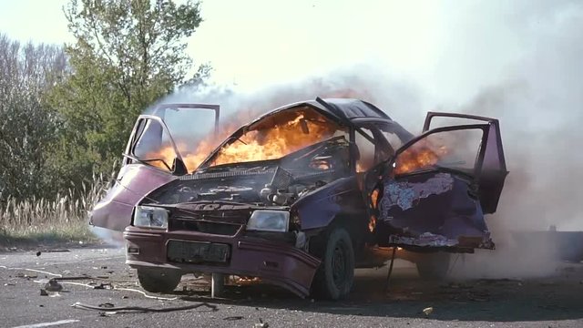 Car Explosion On The Road. Car Bomb. Car Burning.