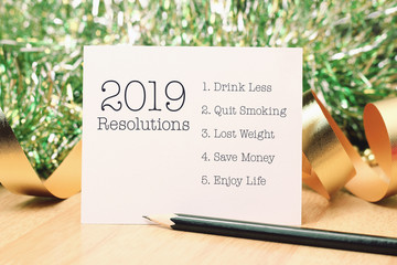 2019 resolutions list with gold decoration.