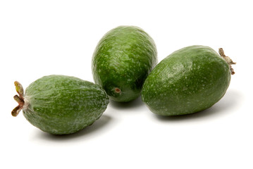 Green feijoa fruits on white background.