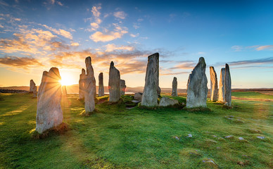 Stunning sunset over the Callanish stone circle on the Isle of Lwais in the Outer Hebrides of Scotland