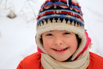 Portrait of beautiful little girl in the winter