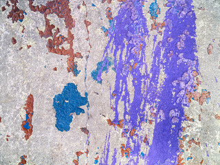 on the concrete wall spilled paint