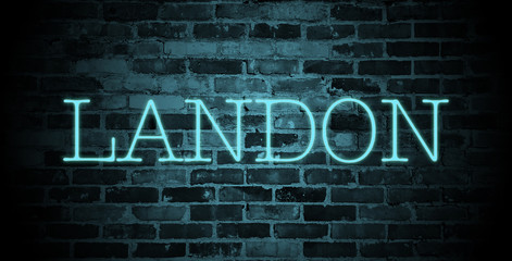 first name Landon in blue neon on brick wall