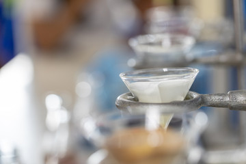 The study Separating by filtration and evaporation condensation the component substances from liquid mixture in Lab.