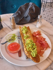 a good breakfast in the morning with ham, tomato and avocado