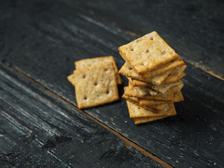 Crackers with cereals on a wooden table