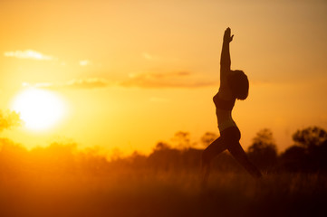 woman exercise in the sunset 