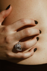 Woman hand with silver ring