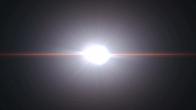 Abstract lens flares light on dark black background. 4K animation.