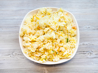 top view of Fried Rice in bowl on gray table