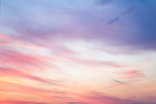 Fototapeta Sky in the pink and blue colors. effect of light pastel colored of sunset clouds  cloud on the sunset sky background with a pastel color  