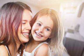 Happy Mother and daughter hugging