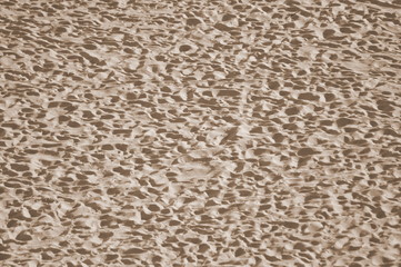 Zoom on the beach from the mediterranean sea 