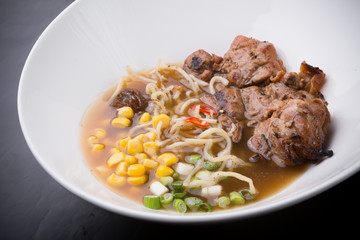 Asian noodles soup with chicken meat