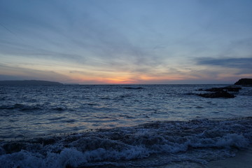 Fototapeta na wymiar waves at sunset