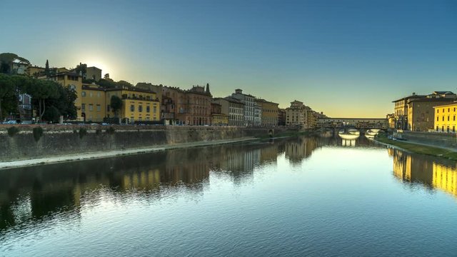 Wide Timelapse Shot Ponte Vecchio / Florence, Tuscany, Italy at Sunset. View of River. 