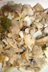 salted mushrooms in sunflower oil close up