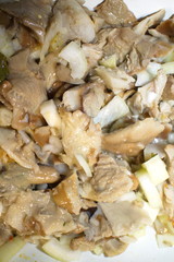 salted mushrooms in sunflower oil close up
