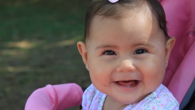 Adorable little girl smiling.