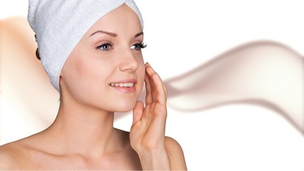 Young beautiful healthy woman with white towel