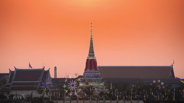 A Sunset is down on top of colorful lighting decorated on temple landmark of landmark temple at samutprakarn provine  located at  thailand