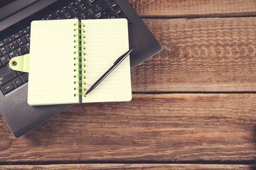 notepad on computer keyboard