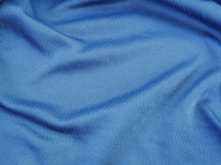 Fototapeta na wymiar blue sportswear clothing texture background,silk fabric background
