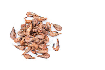 Handful of Steamed grey small shrimps isolated white background top view