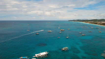 Aerial view of beautiful tropical island with white sand beach, Boracay, hotels and tourists....