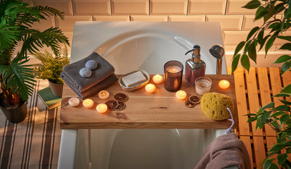 Modern spa tub beauty center candle soap and sauna flower decoration.