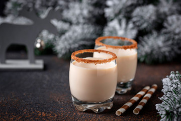 Traditional Christmas winter drink eggnog in glasses