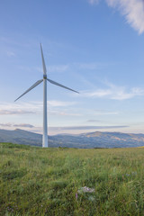 Wind blades on sweet hills