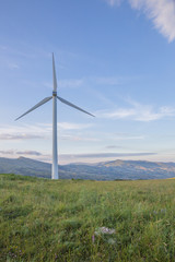 Wind blades on sweet hills