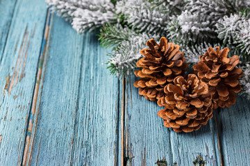 Christmas or New year festive background with pine cones