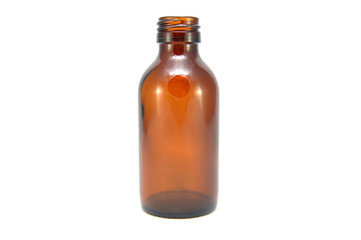 Brown empty bottle on white background close up