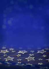 weihnachtlicher Hintergrund königsblau mit goldenen Sternen