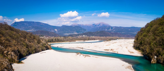 Turquoise river Tagliamente with mountains Flagjel, Cuel Forchia and Cuar