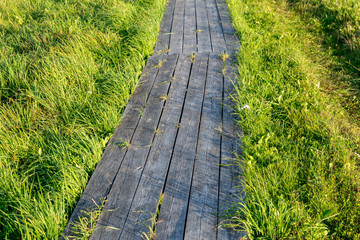 A pedestrian path made of boards