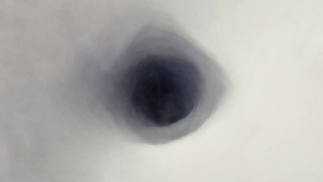 Endless looping smoke hole. Cinema graphics motion loop with white cloud spiral moving Inside 