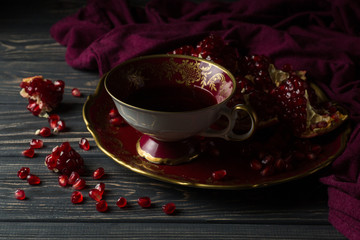 cup with red juice on the table