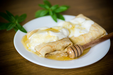 sweet pancakes with cottage cheese, sour cream and