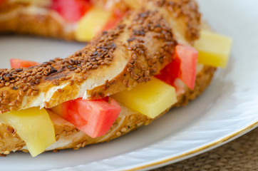 Turkish breakfast with cheese, tomato, simit,