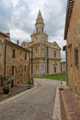Fototapeta na wymiar View of the Sanctuary of the Madonna di San Biagio. Street scene with a view of the church Madonna di San Biagio in Mpntepulciano, Tuscany, Italy