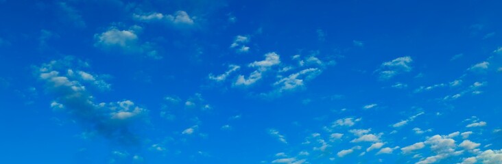 Panoramic photograph of blue sky with clouds